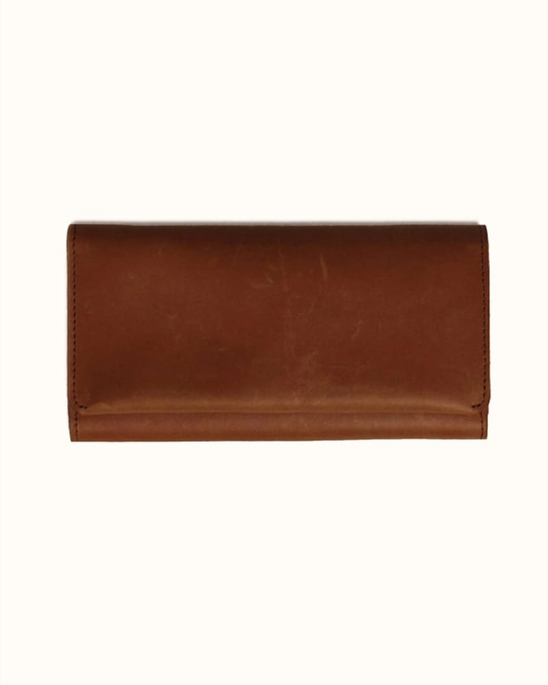 Front of a size O/S Debre Wallet in Whiskey in Whiskey by ABLE. | dia_product_style_image_id:331818